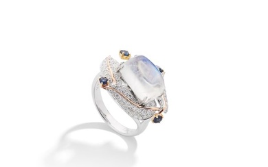 A moonstone, sapphire and diamond ring