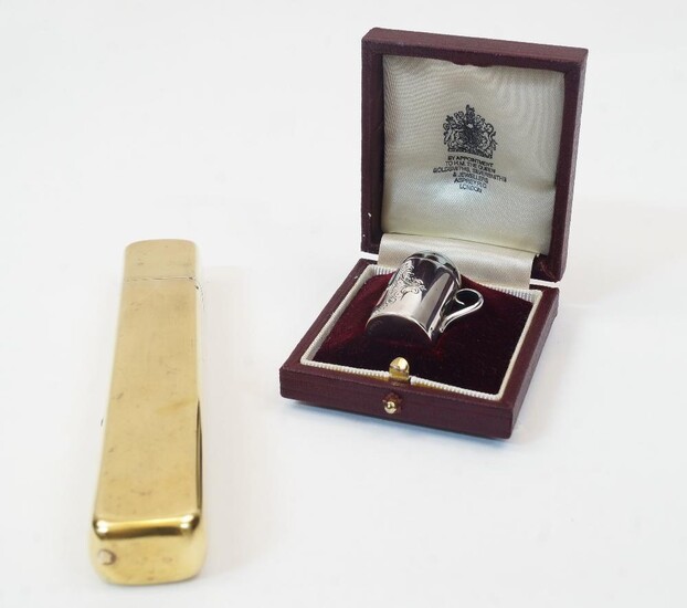 A novelty silver pepper, Birmingham, 1902, makers mark rubbed, with hardstone mounts and scroll handle, in associated Asprey case, 3.1cm high; together with a silver gilt pen case, by Charles & George Asprey, London, 1907, stamped ASPREY LONDON...