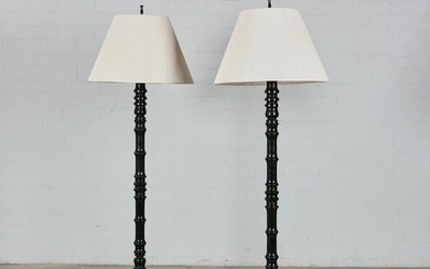 A pair of Contemporary ebonized metal floor lamps