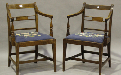 A pair of George IV mahogany elbow chairs with boxwood stringing and drop-in seats, height 85cm, wid