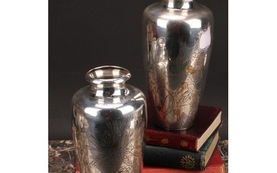 A pair of Japanese silver ovoid vases, chased with flowers p...