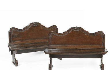A pair of late 17th century Venetian walnut benches