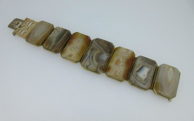 A panel bracelet of banded and spotted agates