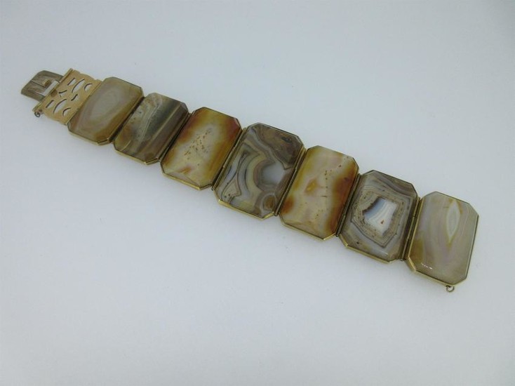 A panel bracelet of banded and spotted agates