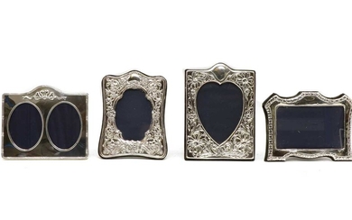 A set of four silver-mounted photo frames