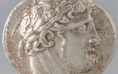 A silver Shekel of Tyre. Obv: Laureate head of...