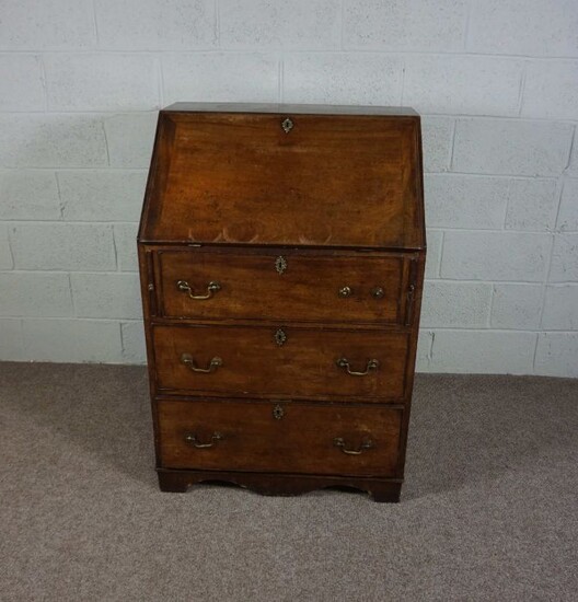 A small George III style mahogany bureau, late 19th century, with fall front and fitted interior
