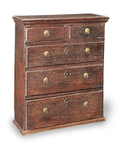A small Queen Anne oak 'table-top' chest of drawers, circa 1710