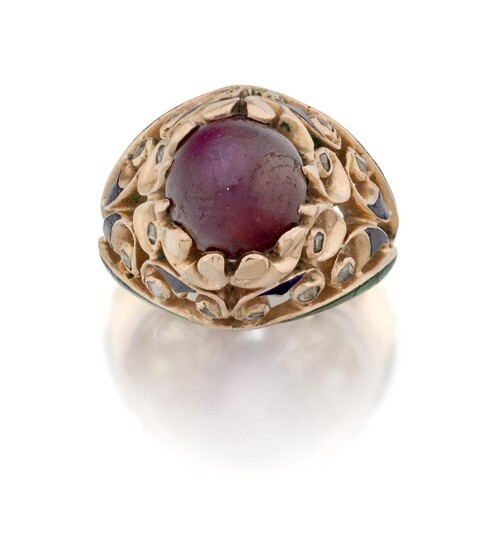 A star ruby single stone bombe ring, the single star ruby claw-set in a raised pierced foliate bezel with rose-cut diamond decoration, with green and blue enamel detail, approx. ring size G½