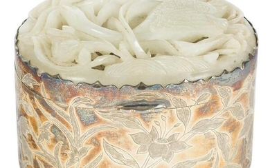 A superb and finely carved and reticulated pale celadon
