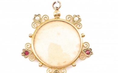 AN ANTIQUE SEED PEARL AND RUBY PENDANT/LOCKET IN GOLD, TOTAL WEIGHT 7.4GMS
