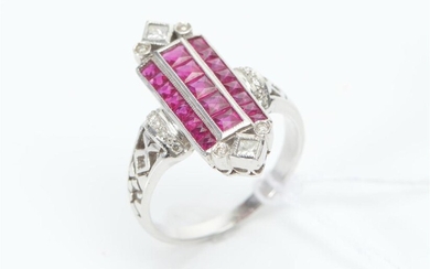AN ART DECO STYLE RUBY AND DIAMOND PLAQUE RING IN 18CT WHITE GOLD, LENGTH OF THE PLAQUE 23MM, SIZE P, 5.6GMS