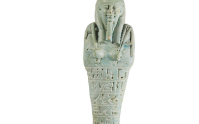 AN EGYPTIAN TURQUOISE FAIENCE SHABTI FOR MEN, LATE PERIOD, CIRCA 664-332 B.C.