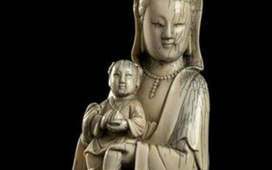 AN IVORY GUANYIN WITH CHILD China, Qing dynasty, 19th