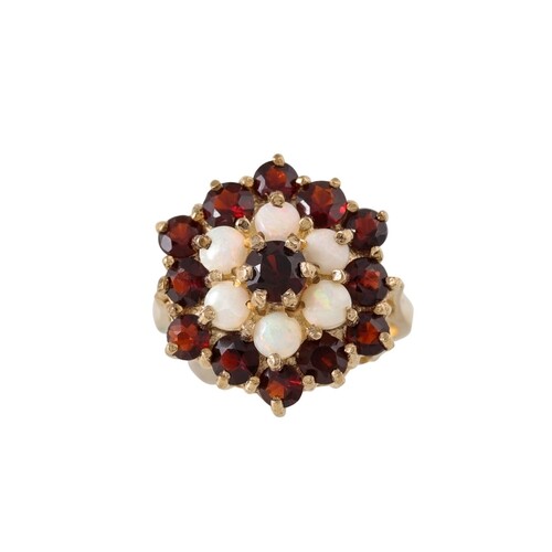 AN OPAL AND GARNET CLUSTER RING, mounted in 9ct gold, size M