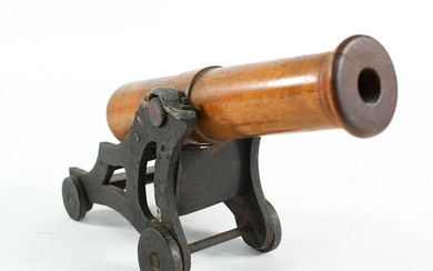 ANTIQUE DIMINUTIVE TURNED WOODEN CANNON