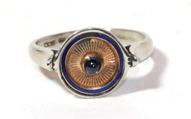 An 18 carat white gold cabochon sapphire and blue enamel...