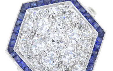 An Art Deco platinum old-cut diamond and calibre-cut sapphire hexagonal cluster ring.