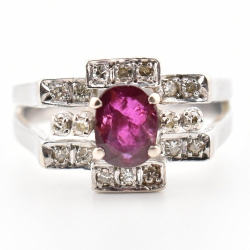 An Art Deco style white gold ruby and diamond cluster ring. ...