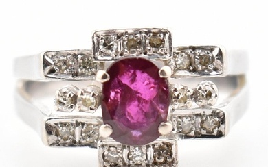 An Art Deco style white gold ruby and diamond cluster ring. ...