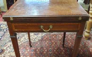 An Edwardian Mahogany and Inlaid Envelope Card Table on squa...