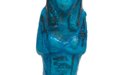 An Egyptian bright blue faience shabti