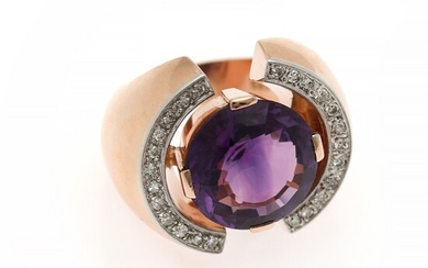 NOT SOLD. An amethyst and diamond ring set with a circular-cut amethyst flanked by numerous...