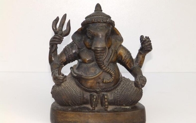 An antique Indian bronze figure of Ganesh, modelled in...