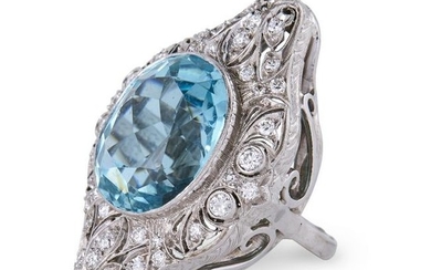 An aquamarine, diamond, and platinum ring
