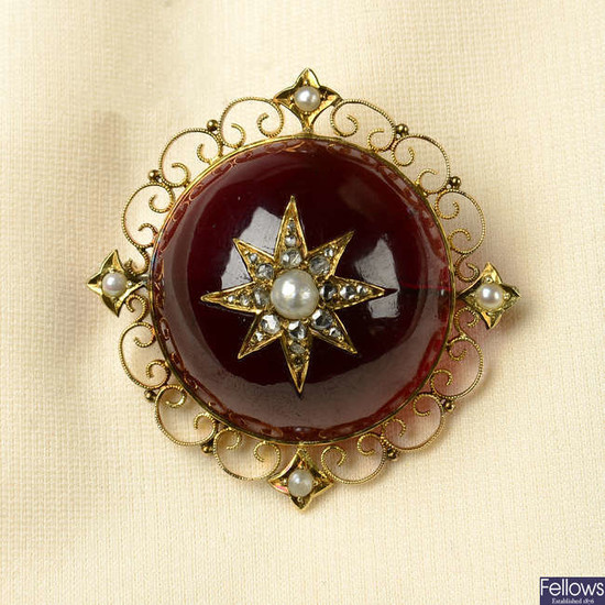 An early 20th century 15ct gold garnet brooch, with split pearl and rose-cut diamond star inset.