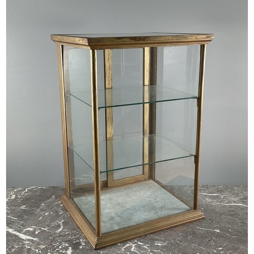 An early to mid 20th century countertop display cabinet, hav...