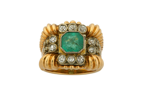 An emerald and diamond dress ring The octagonal-cut...