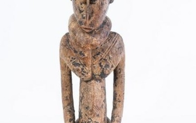 Arte africana Nommo kneeling figure, DogonMali .