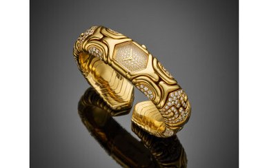 BULGARI "Alveare" lady's yellow gold diamond set bangle watch, quartz movement, g 112.69 circa, diam. cm 5.50 circa. Signed, marked...