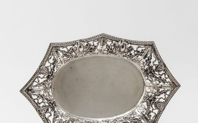Bowl. Oval base, outwardly protruding flag with openwork...