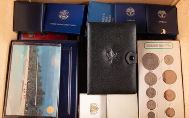 Box with world coin sets, supplemented with silver Gulden coins...