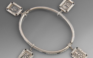 Bracelet jonc en or blanc 750 millièmes serti d'un rang de diamants taille ancienne ponctué...