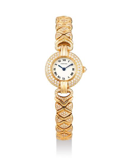 Cartier. A Yellow Gold and Diamond-Set Bracelet Watch