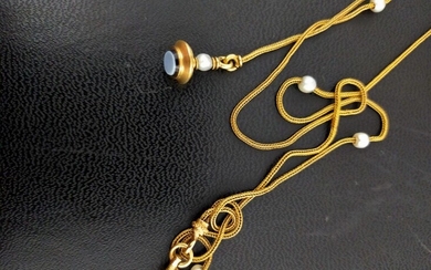 Chaîne giletière à deux brins en or jaune tressé 750 millièmes ornée de petites perles...