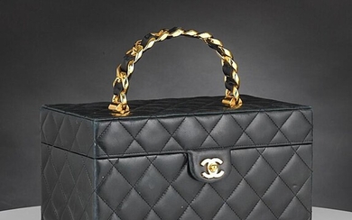 SOLD. Chanel: A beauty box of black quilted lamb skin with one handle, golden hardware and one large interior compartment with four pockets. – Bruun Rasmussen Auctioneers of Fine Art