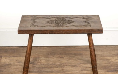 Cotswold School Elm, rectangular table with carved decoration to th...