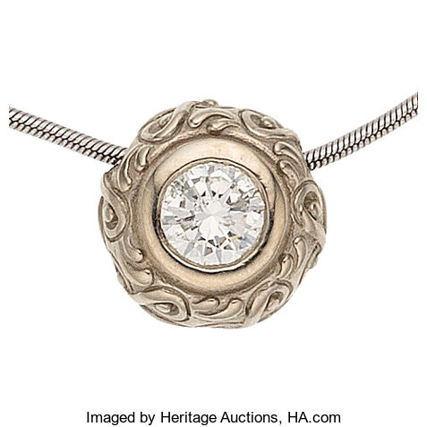 Diamond, White Gold Pendant-Necklace The pendant features a round...