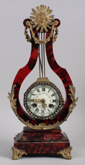 FRENCH GILT-BRONZE AND FAUX PAINTED LYRE-FORM MANTEL CLOCK