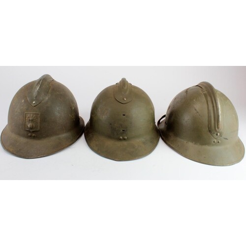 French 'DP' Defence Passive Helmet with others. (3)
