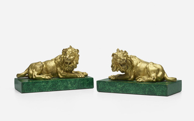 French School Recumbent lion figurines, pair