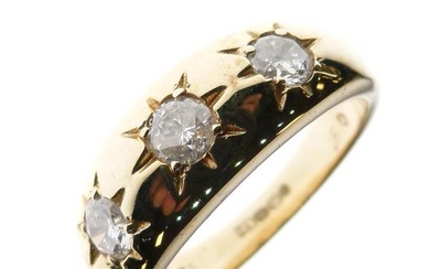 Gentleman's 9ct gold and three stone diamond ring, Gypsy-set,...