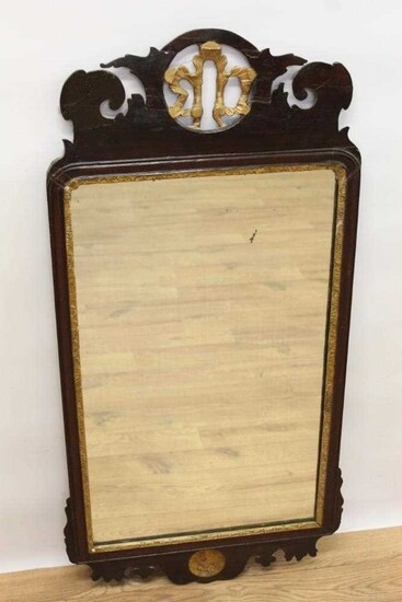 George II style fret carved mahogany wall mirror, rectangular shaped plate in gilt slip and fret frame with shell shaped pierced fret sting, 96 x 47cm