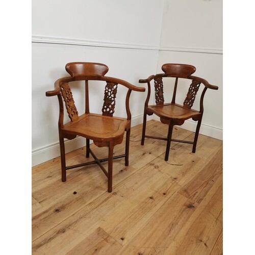 Good quality pair of carved hardwood arm chairs {85 cm H x 7...