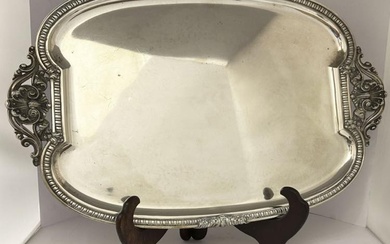 Grande vassoio ovale in argento liscio con bordo centinato e...
