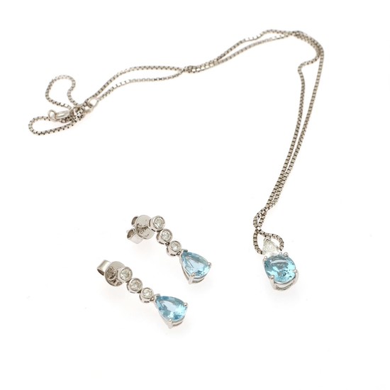 Hartmann's: An aquamarine and diamond jewellery set comprising a necklace and pair of ear pendants, mounted in 18k white gold. Certificate. Circa 2006. (3)